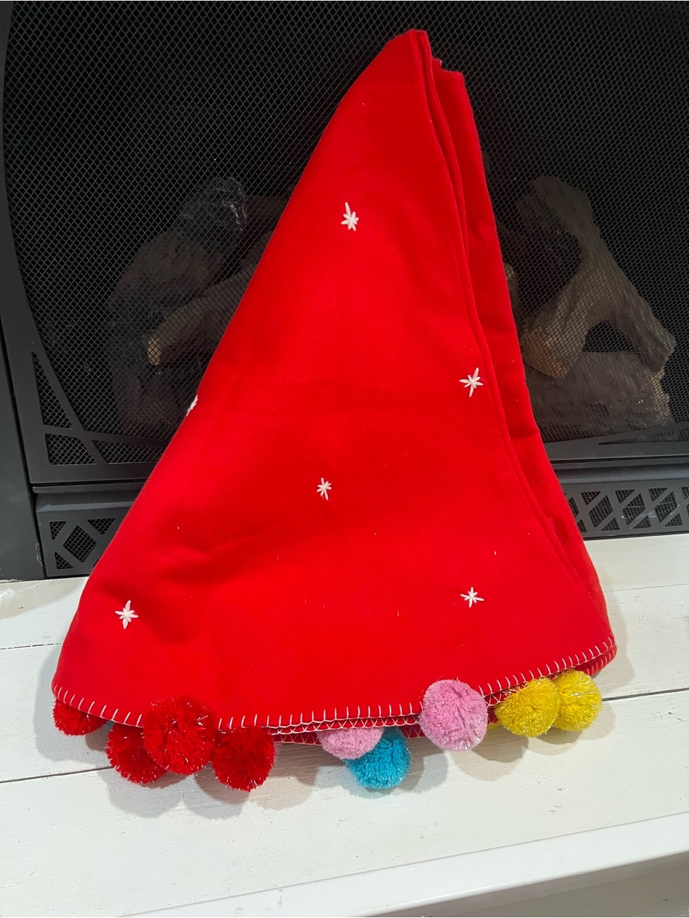 Festive Red Tree Skirt with Colorful Pom Poms